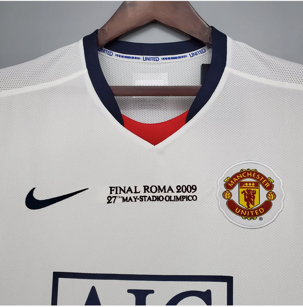 Maillot extérieur Manchester United 2009 avec logo et inscription finale Roma 2009.